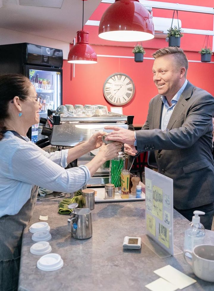 Café staff serving up amazing coffee
